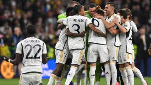 Jogadores do Real Madrid (foto: Glyn KIRK/AFP)