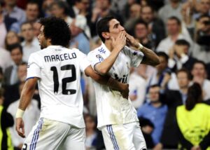 Marcelo e Di Mara pelo Real Madrid (foto: AFP PHOTO/ PIERRE -PHILIPPE MARCOU)