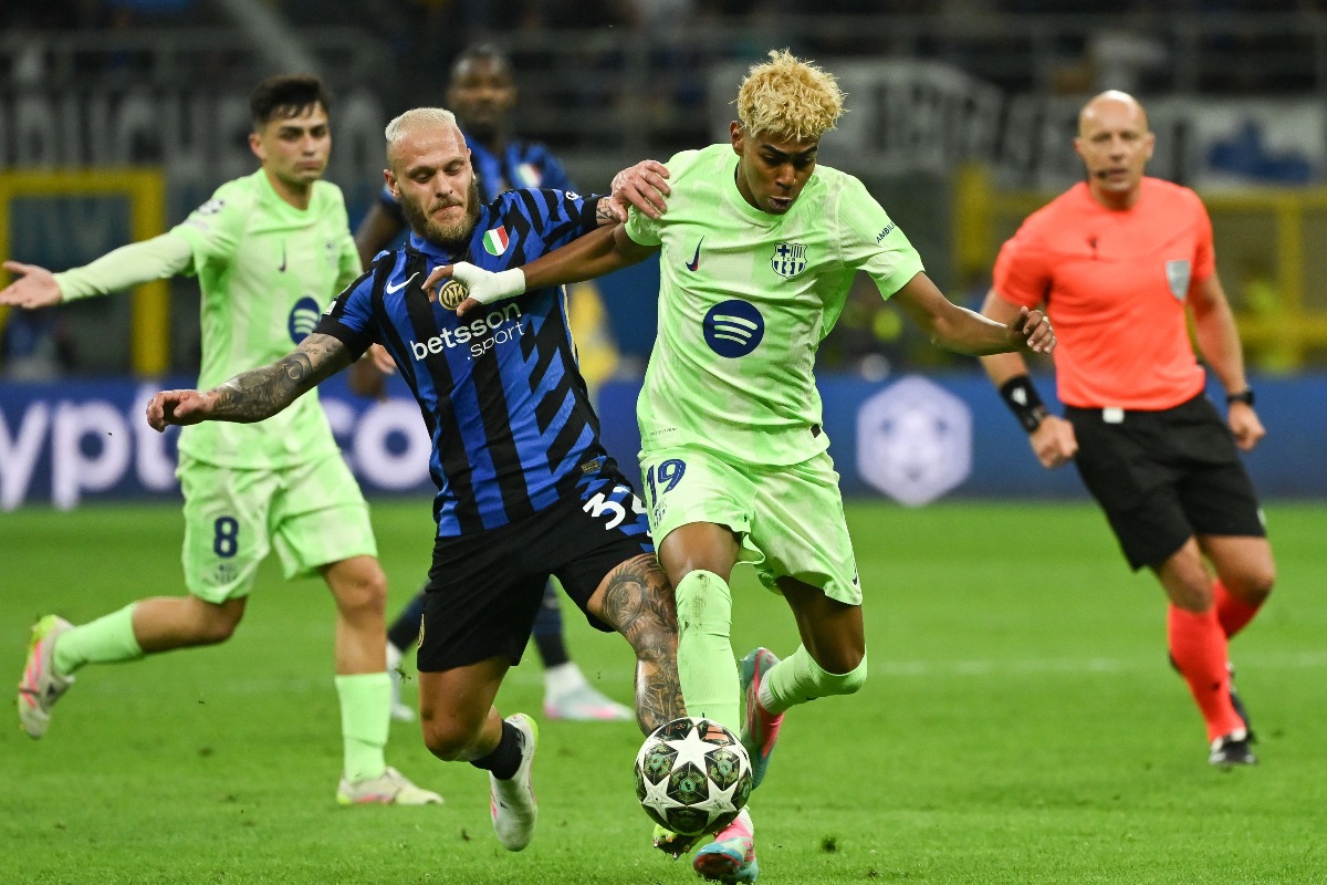 Lance do jogo entre Inter de Milo e Barcelona pela Liga dos Campees - (foto: PIERO CRUCIATTI / AFP) Lance do jogo entre Inter de Milo e Barcelona pela Liga dos Campees - (foto: PIERO CRUCIATTI / AFP)
