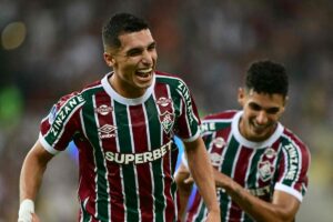Jogadores do Fluminense comemoram gol no Maracan (foto: Pablo PORCIUNCULA / AFP)