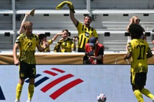 Jogadores do Borussia (foto: PAUL ELLIS / AFP)