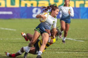 Jogadora de rugby do Brasil em partida contra a Colmbia (foto: Foto Jump/Brasil Rugby/Divulgao)