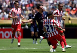 Vitinha celebra gol pelo PSG contra o Atltico de Madrid (foto: Harry How/Getty Images/AFP)