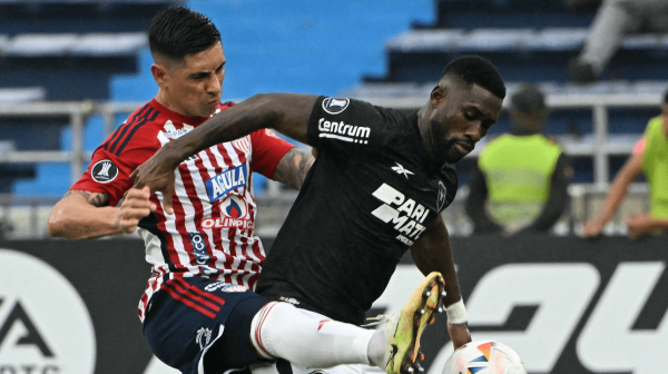 Jogadores de Junior e Botafogo (foto: Luis Acosta/AFP)