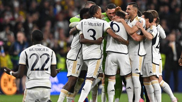 Jogadores do Real Madrid (foto: Glyn KIRK/AFP)