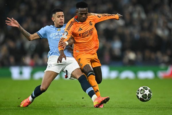 Savinho e Vincius Jnior, atacantes de Manchester City e Real Madrid, em jogo pela Liga dos Campees (foto: PAUL ELLIS/AFP)